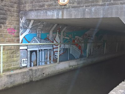 Streets of Colour - wall painting on canal path in Huddersfield