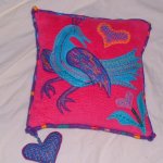 Bright bird cushion