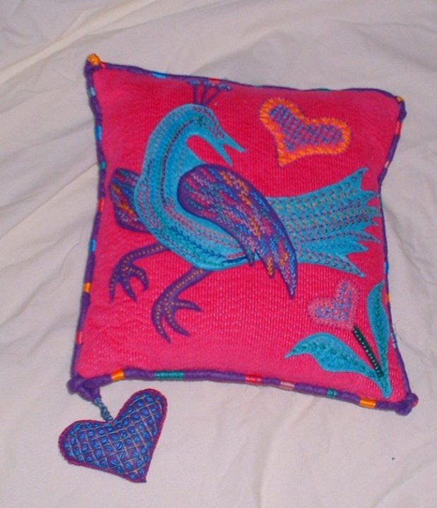 Bright bird cushion