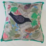 Cushion with garden birds