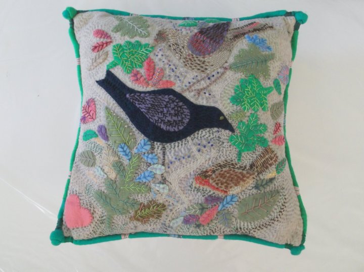 Cushion with garden birds