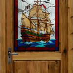 Galleon design door glass