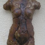 High fired female torso.