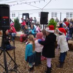 Project Performers singing at Lupton's Christmas event